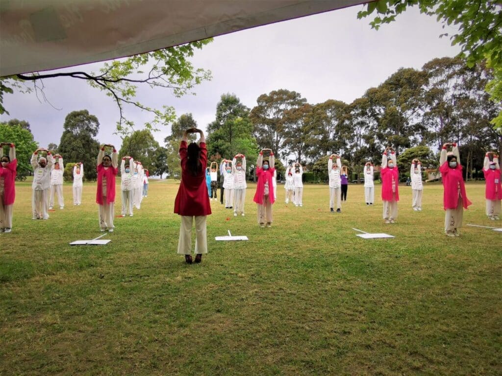 Maintain a safe social distance while practicing Tai Chi